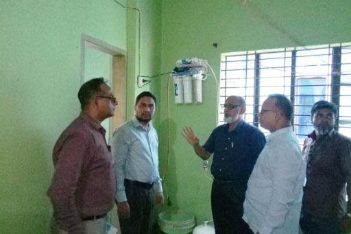 09. Honourable Directors inspect the hostel's Water Purifier with their team