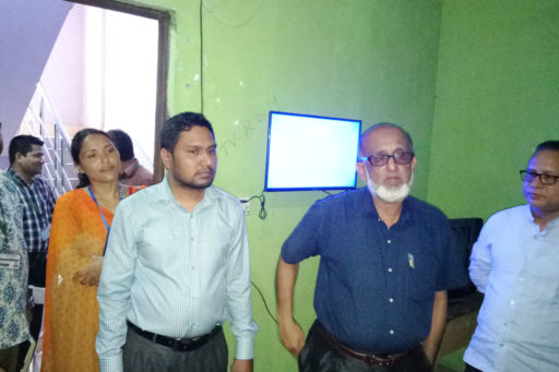 10. Honourable Directors inspect the hostel's Television Room with their team